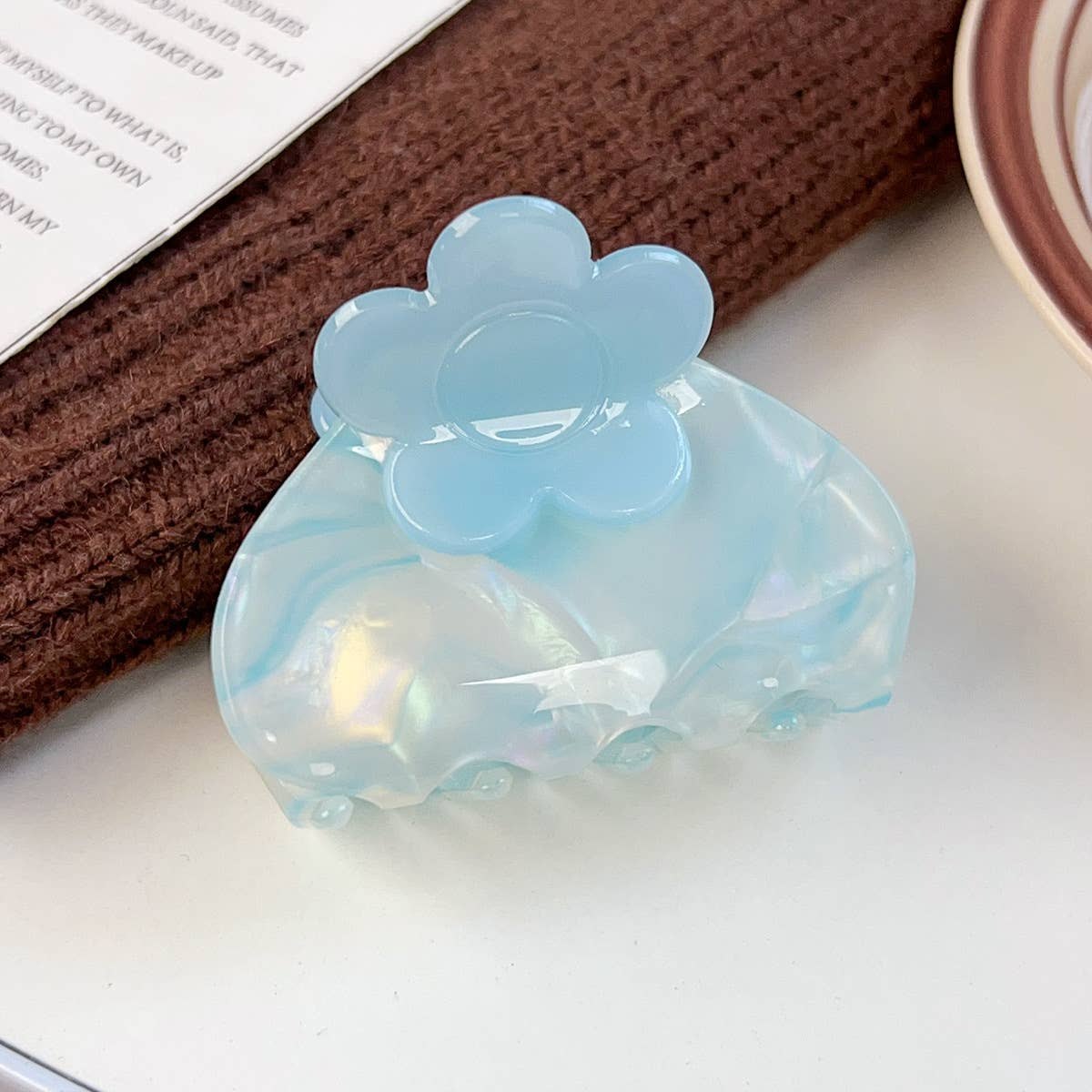 Blue medium claw clip with flower cut out