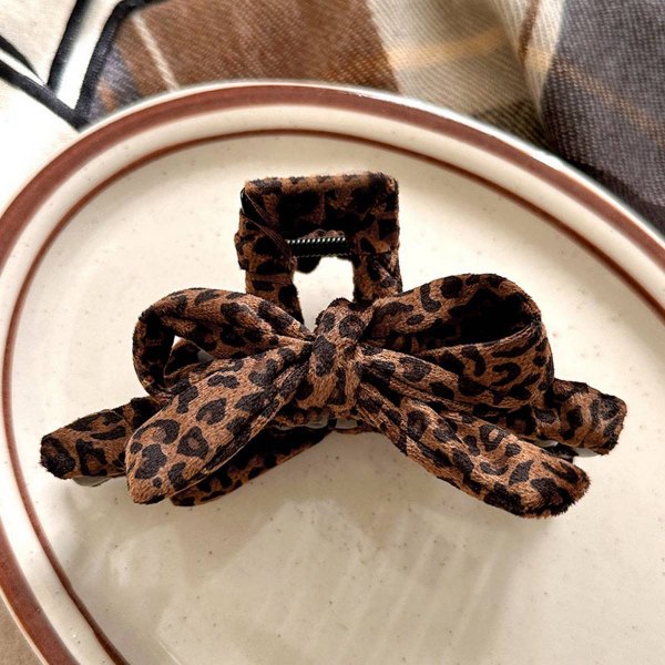 Large leopard print shark claw clip with bow detail
