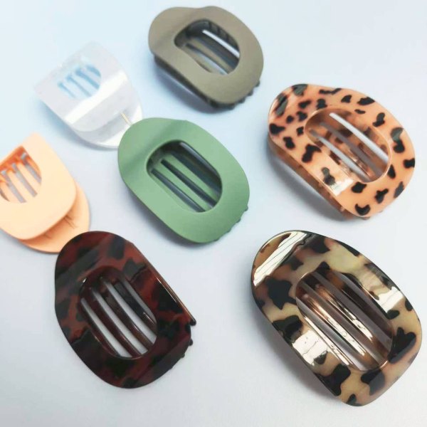 Assorted matte oval hair clips in neutral and leopard prints